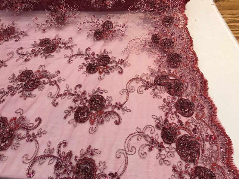 BURGUNDY DESIGN WITH CORD EMBROIDERY ON A MESH LACE-SOLD BY YARD. main image 0