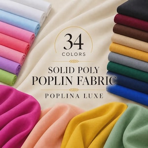 May include: Solid poly poplin fabric in 34 colors, labeled Poplina Luxe. The image displays multiple folded fabric swatches in various shades including white, blue, pink, purple, green, black, maroon, brown, tan, yellow, and gray on a cream background.