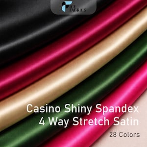May include: A selection of Casino Shiny Spandex 4-way stretch satin fabric in black, burgundy, gold, green, and fuchsia. The fabric is smooth and shiny. The image includes the text "Casino Shiny Spandex 4 Way Stretch Satin" and "28 Colors".