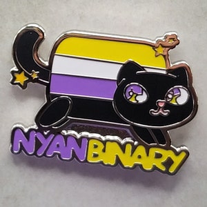 May include: A black cat with yellow stars on its tail and head, wearing a purple, white, and yellow striped shirt. The cat is standing on the word "NYANBINARY" in yellow and purple letters.