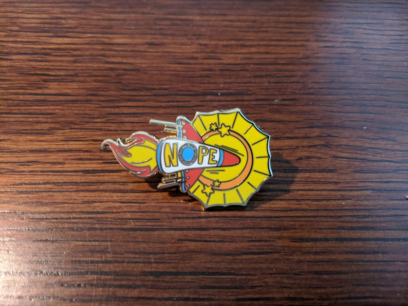 Nope Rocket Flying Into The Sun Hard Enamel Pin