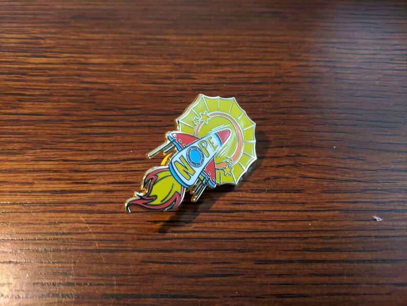 Nope Rocket Flying Into The Sun Hard Enamel Pin
