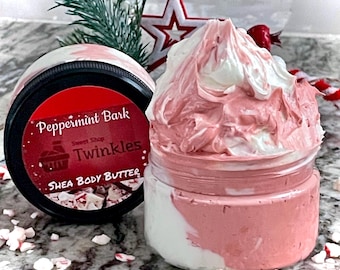 May include: A jar of Peppermint Bark Shea Body Butter with a white and pink swirl. The jar is labeled "Sweet Shop Twinkles" and "Peppermint Bark Shea Body Butter".