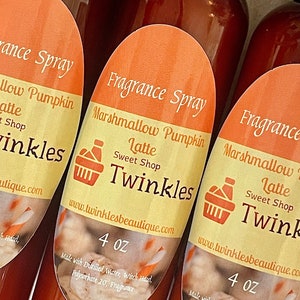 May include: Three 4 ounce bottles of fragrance spray with orange labels. The labels say "Fragrance Spray", "Marshmallow Pumpkin Latte", "Sweet Shop", "Twinkles", and "www.twinklesbeautique.com". The bottles are made with distilled water, witch hazel, polysorbate 20, and fragrance.