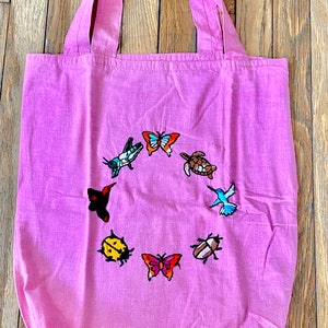 Bolsa de lino bordada a mano con diseño de animales