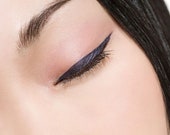Liquid, Precision Eyeliner. Long lasting and comes in 5 colors. Great for wedding makeup