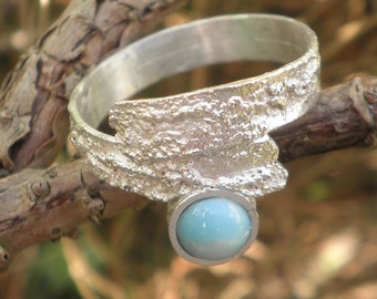 Silver ring with Larimar