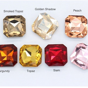 May include: Assortment of eight square-shaped glass rhinestones in various colors, including smoked topaz, golden shadow, peach, burgundy, topaz, siam, and light rose.