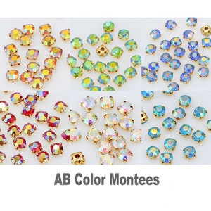 May include: Assortment of AB color glass rhinestones with gold settings. The rhinestones are in six different colors: red, green, blue, light blue, clear, and iridescent.