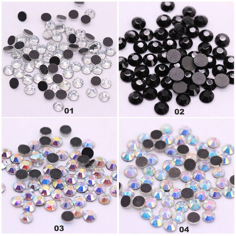May include: Four groups of rhinestones with adhesive backs. The first group is clear, the second is black, the third is iridescent, and the fourth is iridescent. Each group is labeled with a number from 01 to 04.