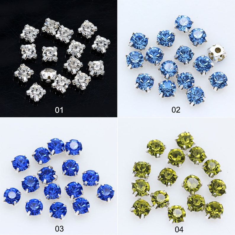 May include: Assortment of 12 round rhinestones with silver settings. The rhinestones are available in four colors: clear, light blue, dark blue, and green.