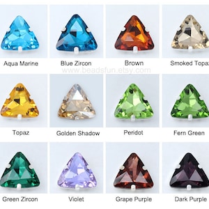 May include: Twelve triangular rhinestones in various colors, including aqua marine, blue zircon, brown, smoked topaz, topaz, golden shadow, peridot, fern green, green zircon, violet, grape purple, and dark purple.  www.beadsfun.etsy.com