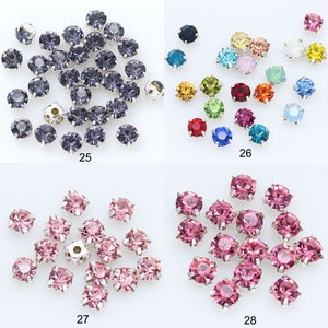 May include: Assortment of small, round, silver-toned rhinestones with various colored crystals. The rhinestones are arranged in four groups, each with a different color: purple, rainbow, pink, and pink.