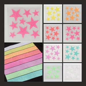 Stelle glitterate che si illuminano al buio da applicare con il ferro da stiro. Quadro termoadesivo con stelle neon