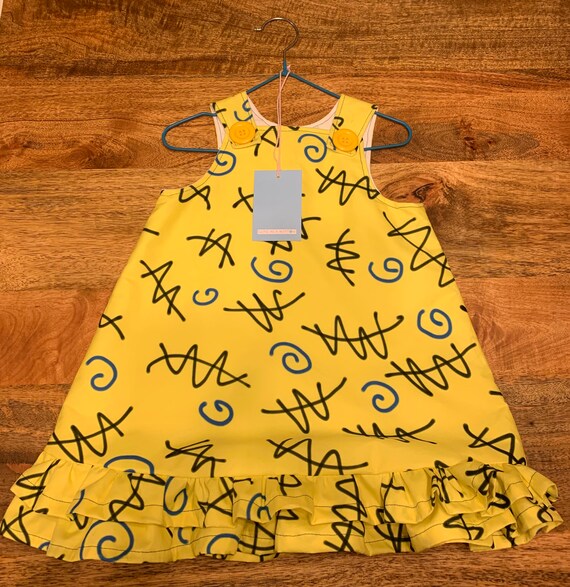 yellow pinafore