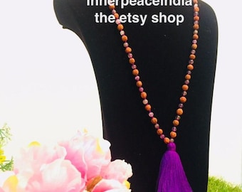 Beaded Jewelry in semiprecious Amethyst and Rudraksha. Handmade knotted 108 beads for chanting.