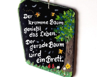 Pizarra con letrero que dice árbol