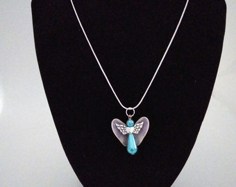 Seashell guardian angel necklaces.