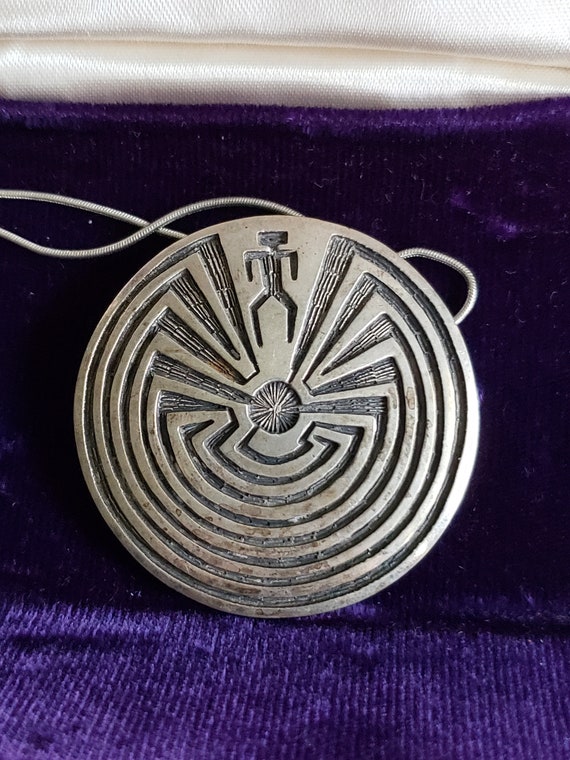 Hopi made round Pendant on an 18-inch chain SS
