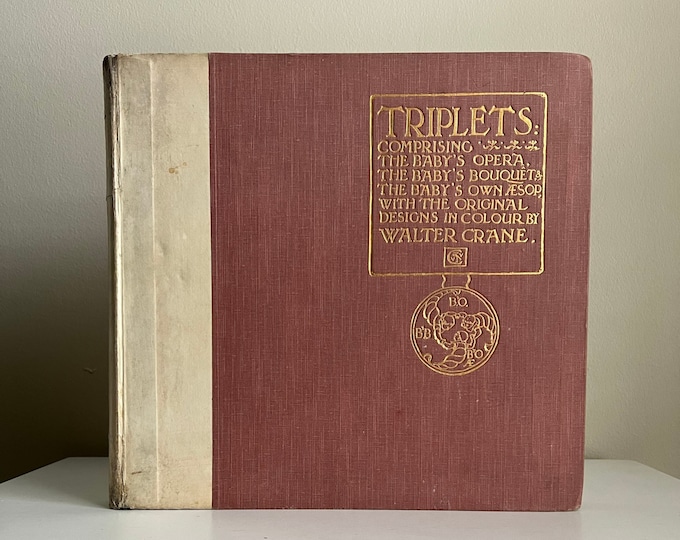 1899 Triplets, comprising “The Baby’s Opera”, “The Baby’s Bouquet”, and “The Baby’s Own Aesop” with the original designs of Walter Crane