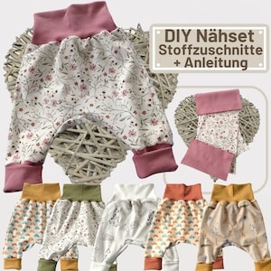 May include: Baby harem trousers in various patterns, including floral, animal, and rainbow designs. The trousers feature a high waistband and cuffs in coordinating colours. The image also includes the text "DIY Nähset Stoffzuschnitte + Anleitung."