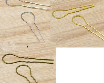 2 large hairpins, silver/gold/bronze