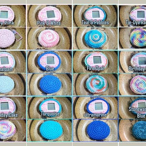 May include: A collection of 10 crochet keychains in various colors and patterns, each featuring a small digital pet device. The keychains are displayed on a brown background.