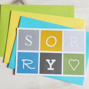 Klappkarte Sorry / Karte Tut mir leid / Entschuldigungskarte mit Herz - in blau grün gelb grau