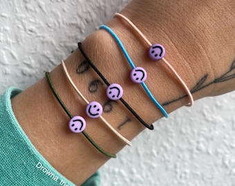 Smiley bracelet lilac elastic band threaded