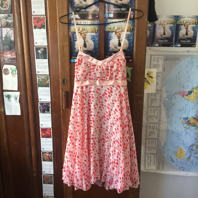 Stupid Cupid Saint Valentine/'s 1960s Babydoll Pink and Red Hearts Dress with Pale Pink Satin Accents and Tie Up Bow