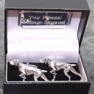 May include: A pair of silver cufflinks in a black box. The cufflinks are shaped like German Shorthaired Pointers. The box has a silver plaque that says "Your Personal Message Engraved".