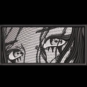 May include: Black and white embroidered patch featuring a close-up of a woman's eyes with tears running down her cheeks.