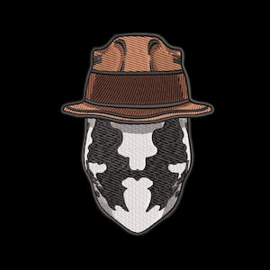 May include: Embroidered patch featuring a brown fedora atop a black and white inkblot design. The patch has a detailed, stitched appearance, with a black background. The design is reminiscent of a comic book character.