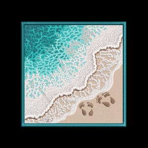 May include: A framed embroidery design featuring a turquoise blue ocean wave crashing onto a sandy beach with two sets of footprints in the sand.