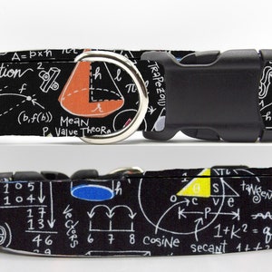 May include: Black dog collar with a white and black pattern of math equations and symbols. The collar has a black buckle and a silver D-ring.