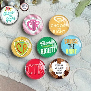 May include: A collection of nine circular glass cabochon pins or magnets featuring various designs. The graphics include the text Choose the Right, CTR, and Together We Can Do Great Things, alongside shield icons, a ring symbol, and colorful hand illustrations.