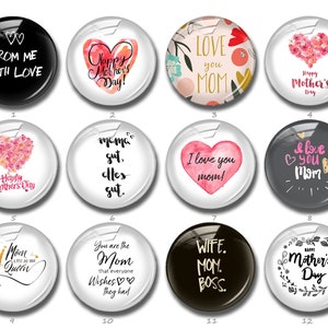 May include: A collection of twelve glass cabochons with various designs and text, including "Happy Mother's Day," "Love You Mom," and "From Me With Love." The cabochons feature hearts, floral patterns, and crowns.