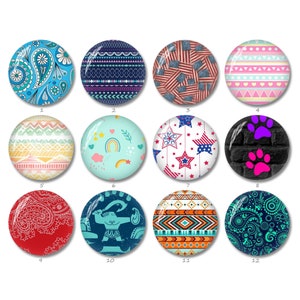 May include: A collection of twelve round decorative magnets with various designs. The designs include paisley, geometric patterns, American flags, stars, paw prints, and an elephant. The magnets are in shades of blue, red, pink, and orange.