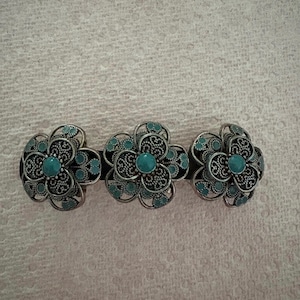 Vintage inspired 80mm hair barrette with floral turquoise colored & silver metal colored beads. Perfect for weddings and special events.