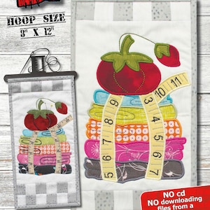 May include: A fabric embroidery pattern with a stack of colorful fabric pieces topped with a tomato and measuring tape. The text reads "SEW NECESSARY" and "finished: 6 1/2 x 12 1/4". The hoop size is 8" x 12".