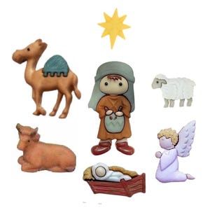 May include: A collection of Christmas-themed figurines, including a camel, a star, a shepherd, a sheep, a cow, an angel, and baby Jesus in a manger. The figurines are in various colors, such as brown, white, and orange.