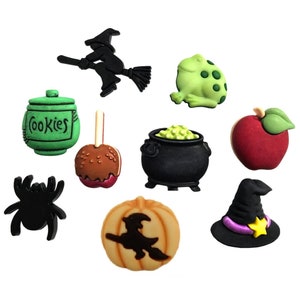 May include: A set of ten Halloween-themed buttons featuring a witch on a broomstick, a frog, a cauldron, an apple, a spider, a candy apple, a cookie jar, a pumpkin, and a witch's hat.