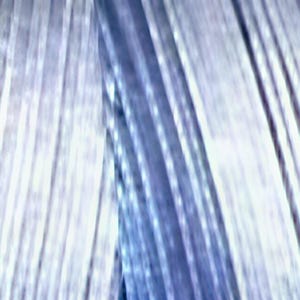 May include: A close-up view of multiple parallel strands of metallic silver wire or thread. The strands are arranged vertically, creating a textured, reflective surface with varying shades of light and dark blue highlights across the metallic finish.