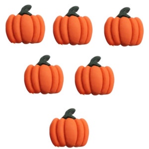 May include: Five orange pumpkins with black stems. The pumpkins are all the same size and shape.