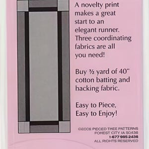May include: A pink instructional sewing pattern sheet titled Frame Up with a finished size of 14.5 inches by 36 inches. It features a graphic of a rectangular runner, text instructions for fabric requirements, and the Pieced Tree Patterns logo.