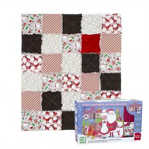 May include: A rag quilt featuring a grid of squares with patterns of Santa Claus, red and white stripes, black with white dots, and white with black swirls. Beside the quilt is a rectangular box labeled The Snuggle Quilt Kit with an illustration of Santa.