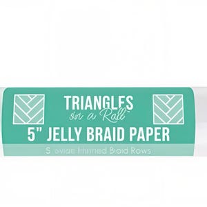 May include: A roll of 5 inch Jelly Braid Paper featuring a teal label with white text that reads Triangles on a Roll, 5 inch Jelly Braid Paper, and 5 bias finished Braid Rows, with two square icons displaying a white herringbone pattern.