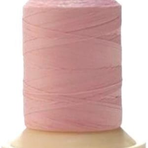 May include: A spool of pink thread wound on a white plastic bobbin.