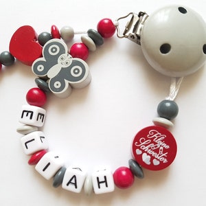 Schnullerkette mit Namen Schmetterling,rot/grau,Herz,kleine Schwester,Geschenk,Babyshower,Nuggikette,Schnullerband,Baby,Mädchen,Junge,Holz