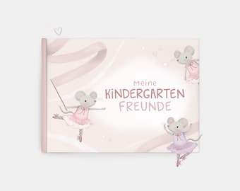 May include: A children's book with a soft pink cover featuring the text "Meine Kindergarten FREUNDE." The cover art includes illustrations of gray mice in pink ballet outfits, with ribbons and hearts.